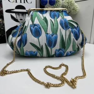 Borsa clutch in tessuto jaquard con tulipani blu