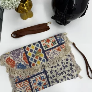 Borsa pochette in stoffa con fantasie multicolor