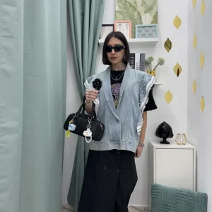 Gonna lunga con bottoni e cintura