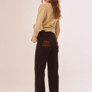 Jeans con impunture a contrasto